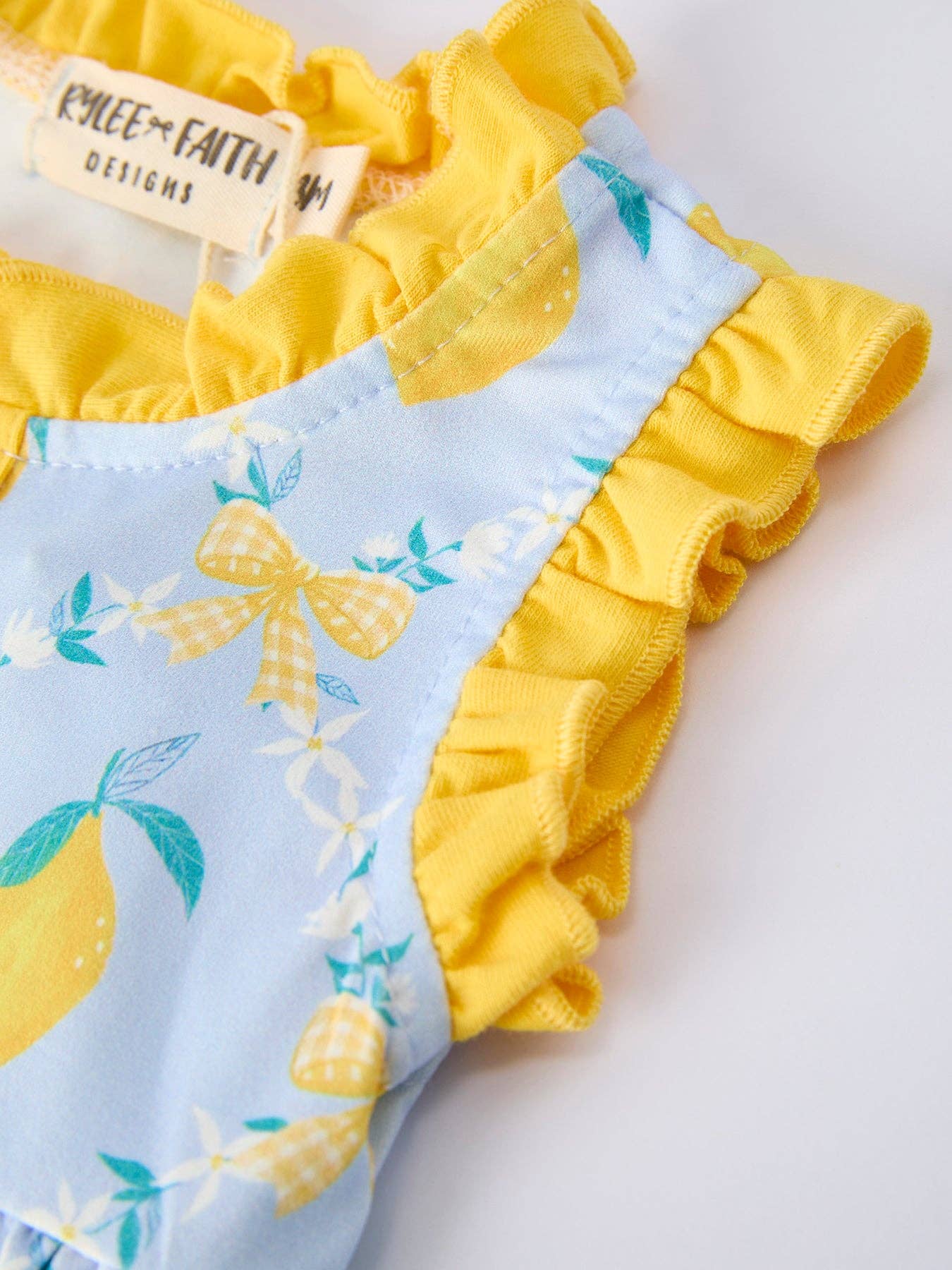 Lemon Floral Print Girl Sleeveless Ruffle Romper