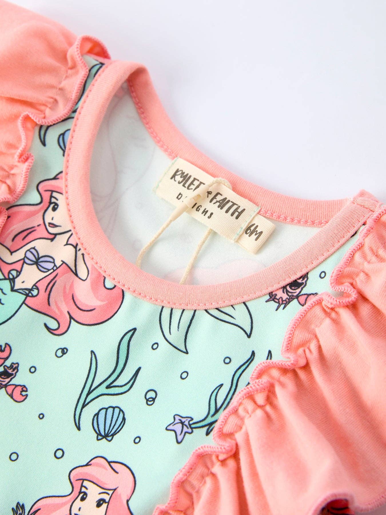 Ocean Girls Bow Ruffle Romper